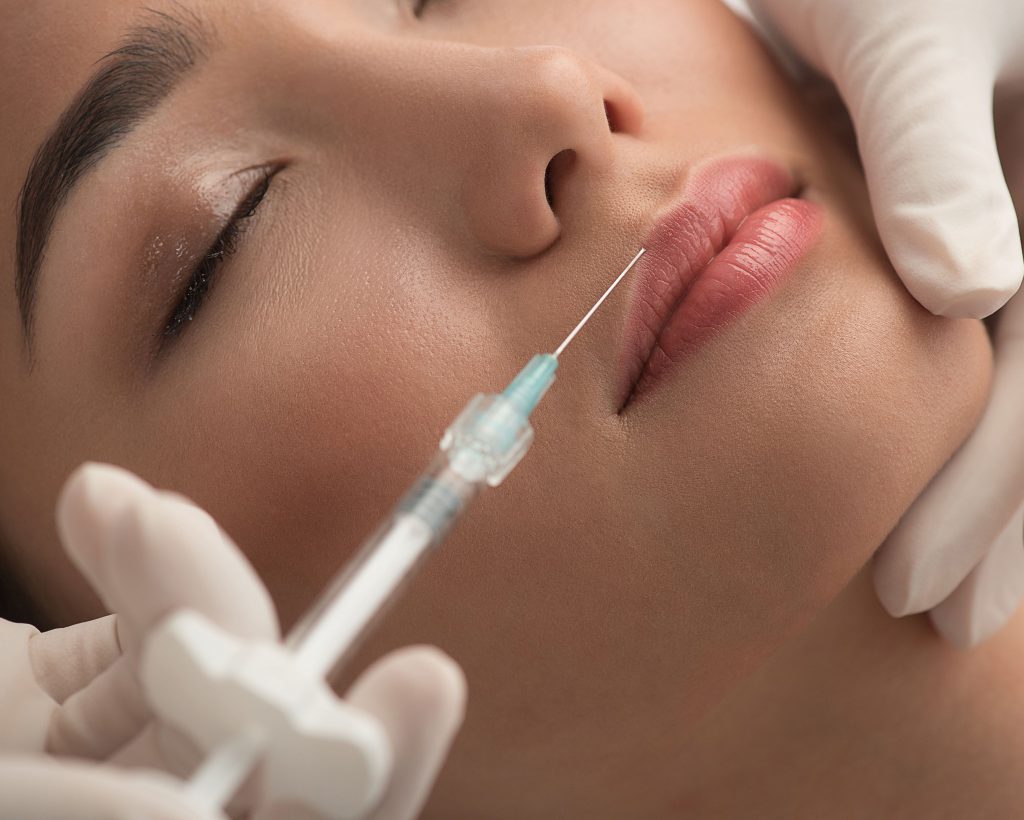 Photo of a woman getting lip injections