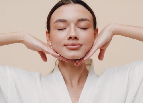 Photo of a woman with plump lips and cheeks after dermal fillers
