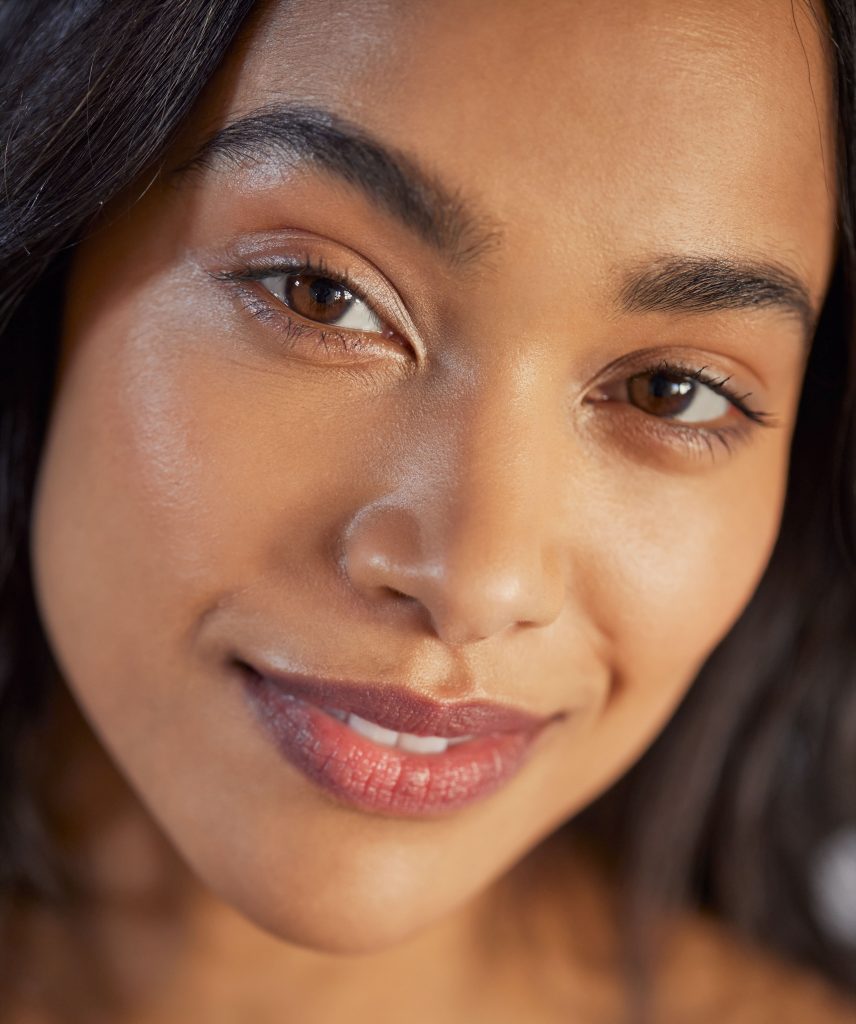Photo of an attractive woman with great skin after fibroblast skin resurfacing