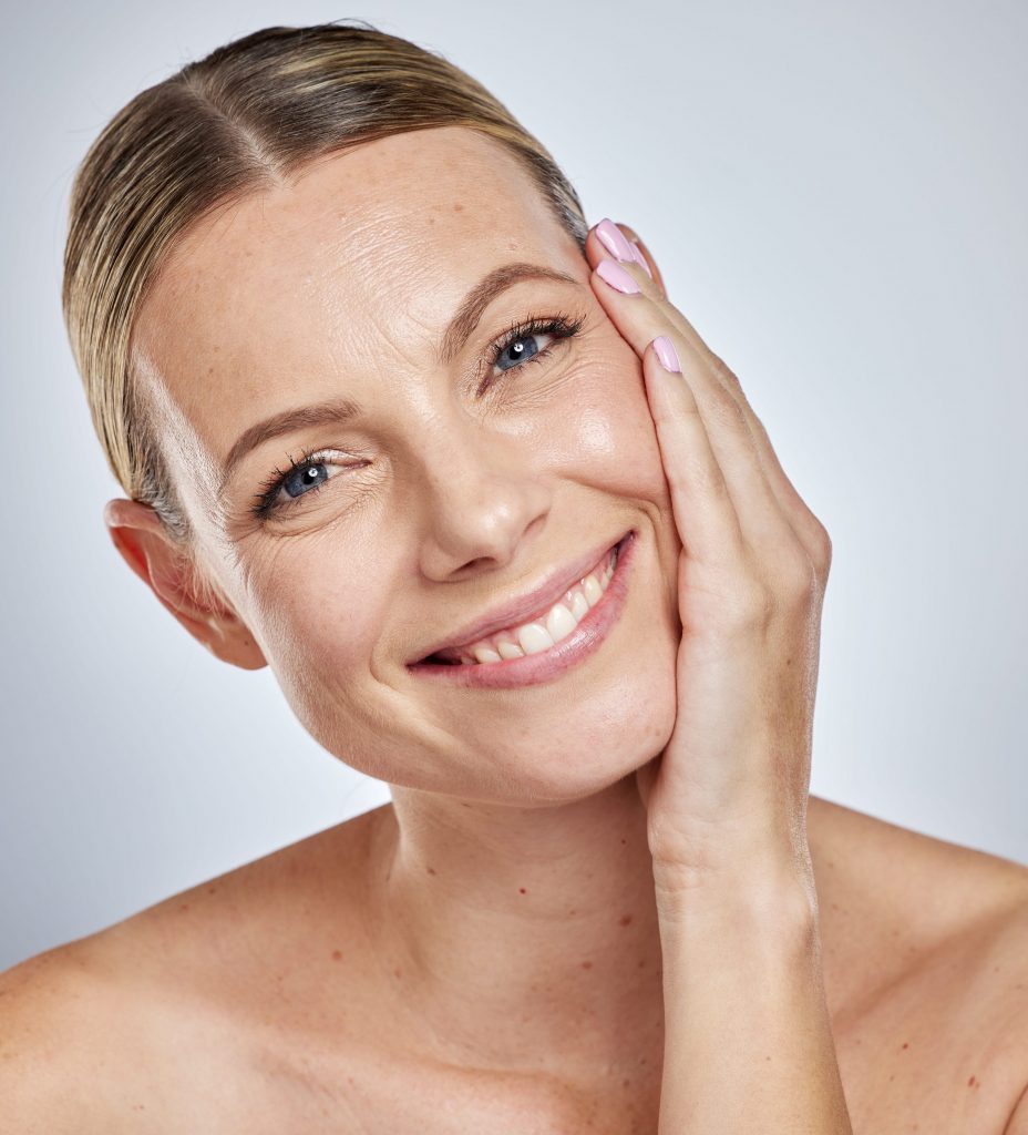 Photo of a woman with facial wrinkles and slight pigmentation