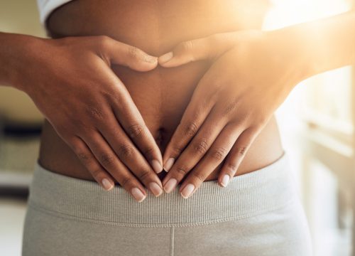 Photo of a woman's flat stomach after liposuction