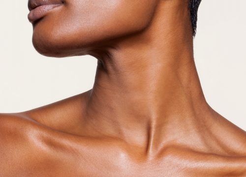 Photo of a woman's youthful neck after a neck lift procedure