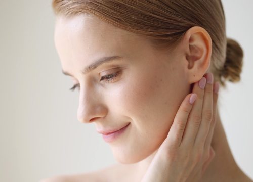 Photo of a young woman with glowing skin