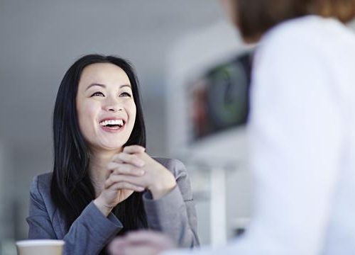 Photo of a happy woman after eyelid surgery
